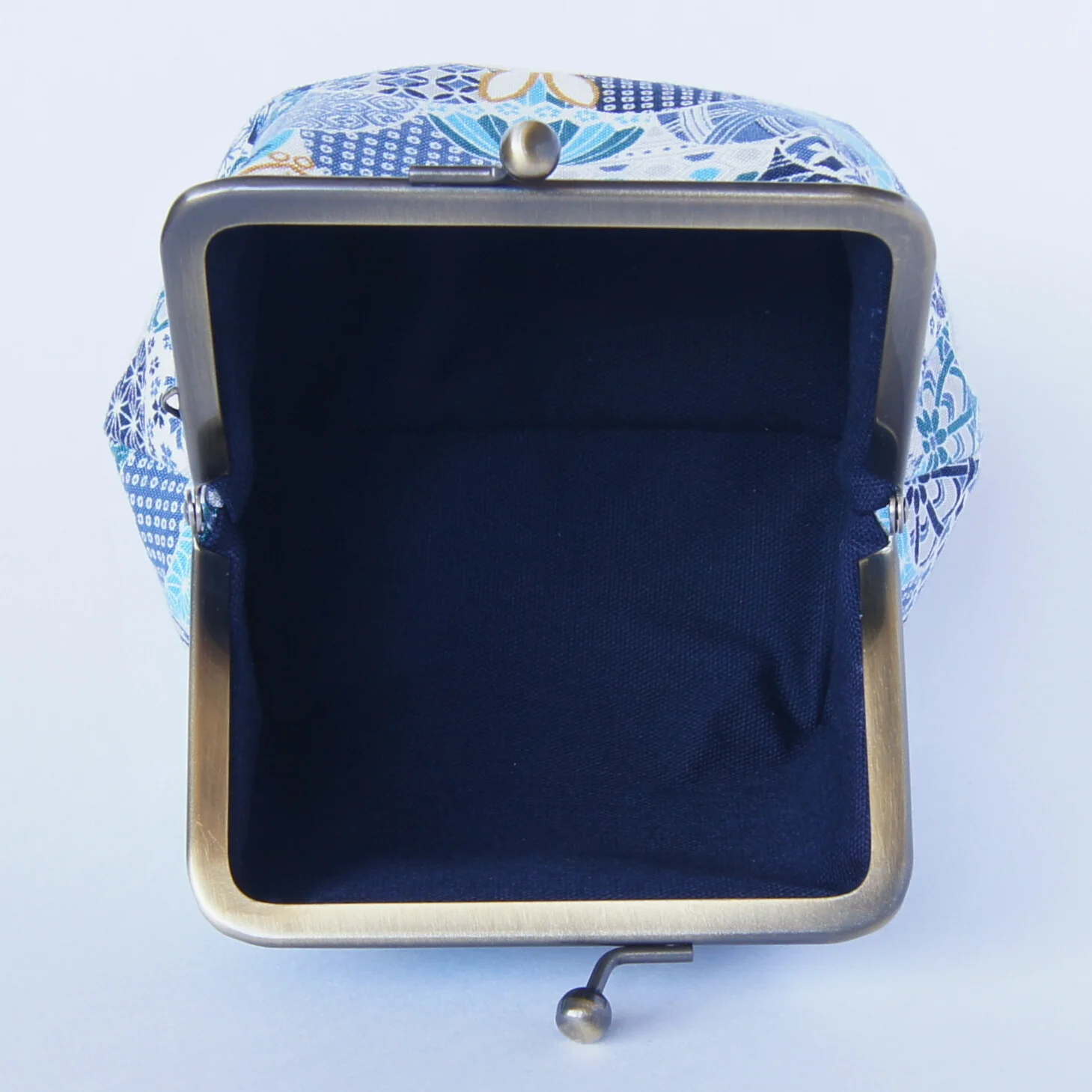 A third view of the blue rabbit-pattern pouch, color 1