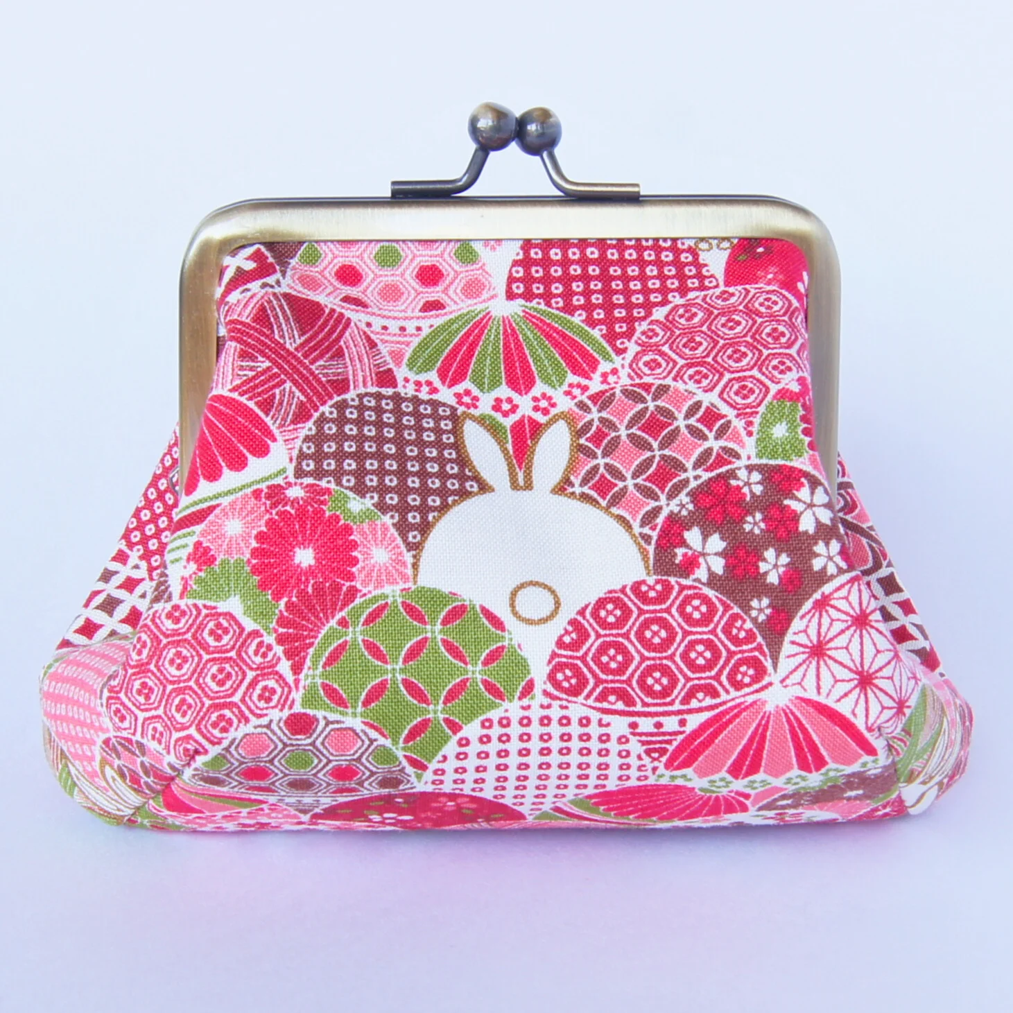 Another view of the red rabbit-pattern pouch, color 2
