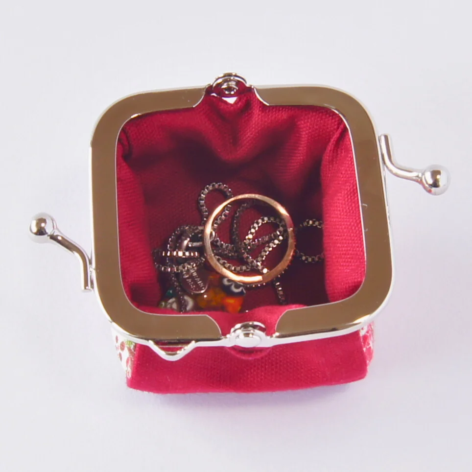 Small accessories stored in the open purse