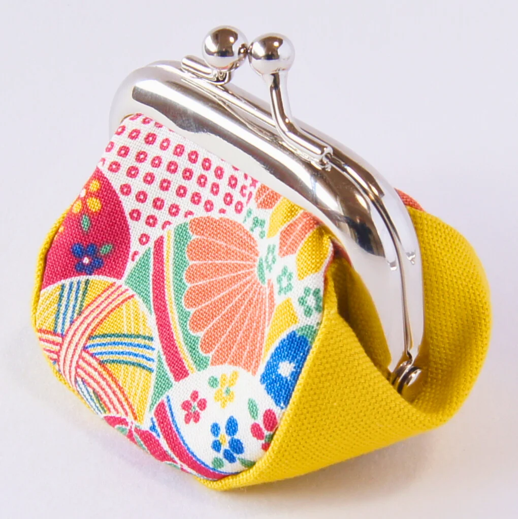 A third view of the yellow Mari and Sakura purse, color 1