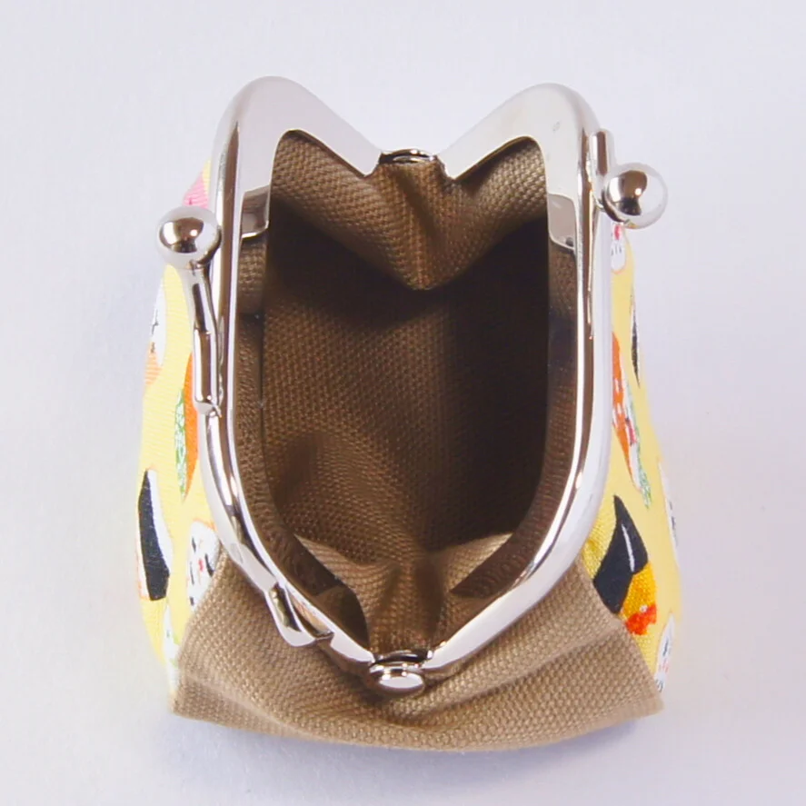 Strap ring on the purse's clasp frame