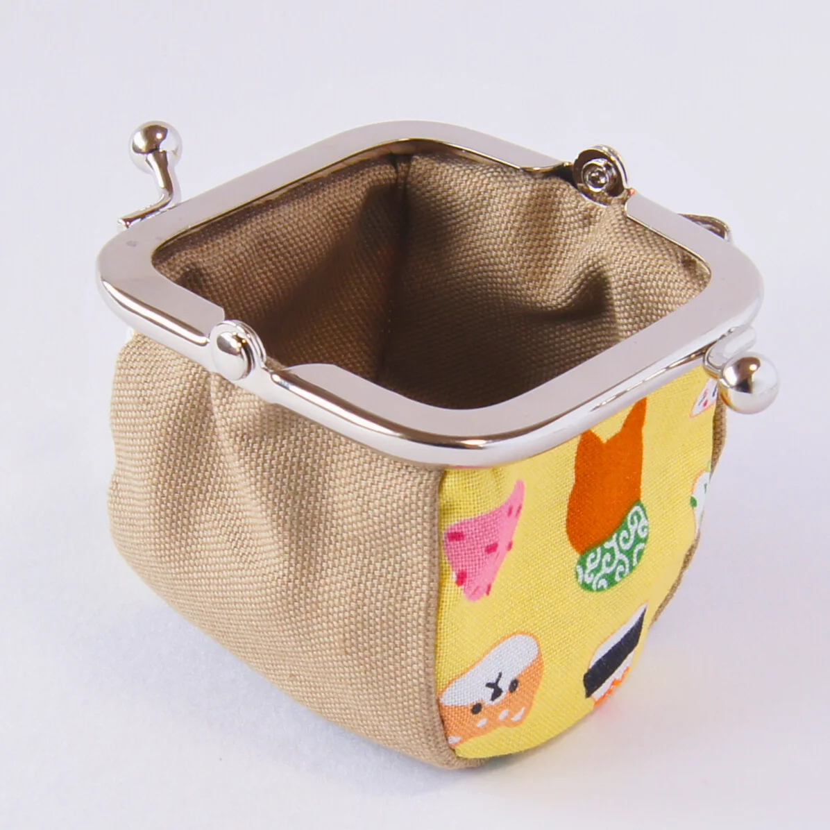 The purse opened wide, showing its gusset
