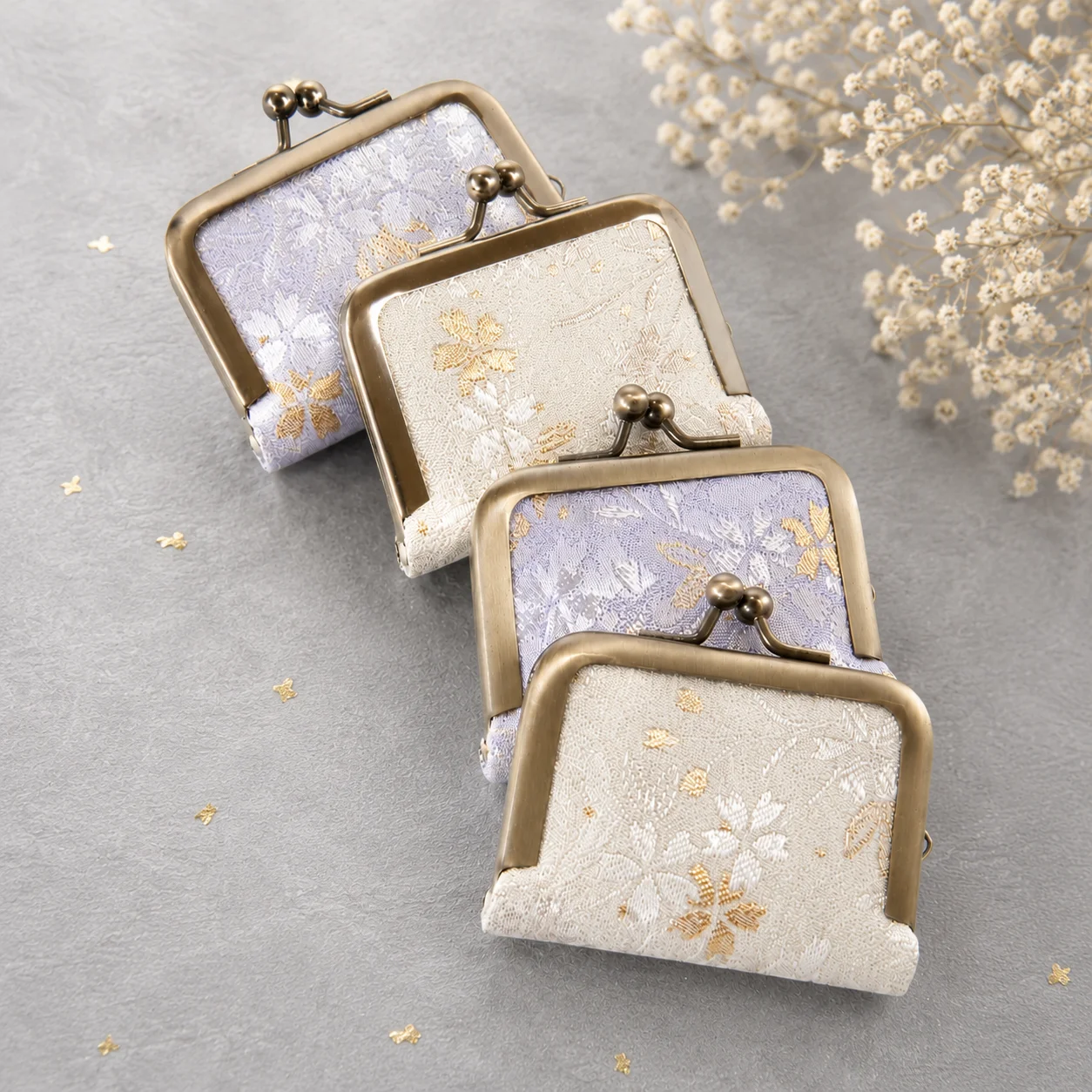 Saiho gamaguchi jewelry pouch in Sakura-gasumi Kinran fabric