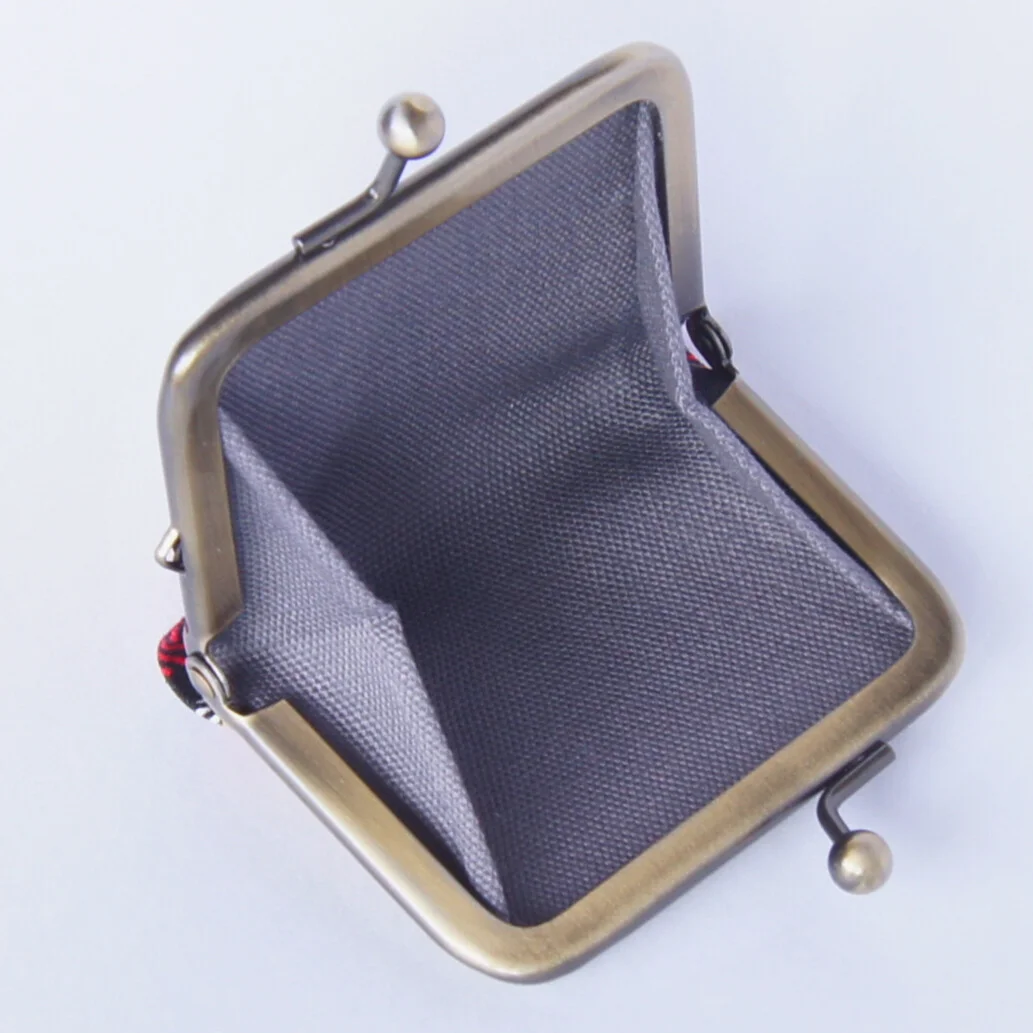 The pouch opened wide to show its interior gusset