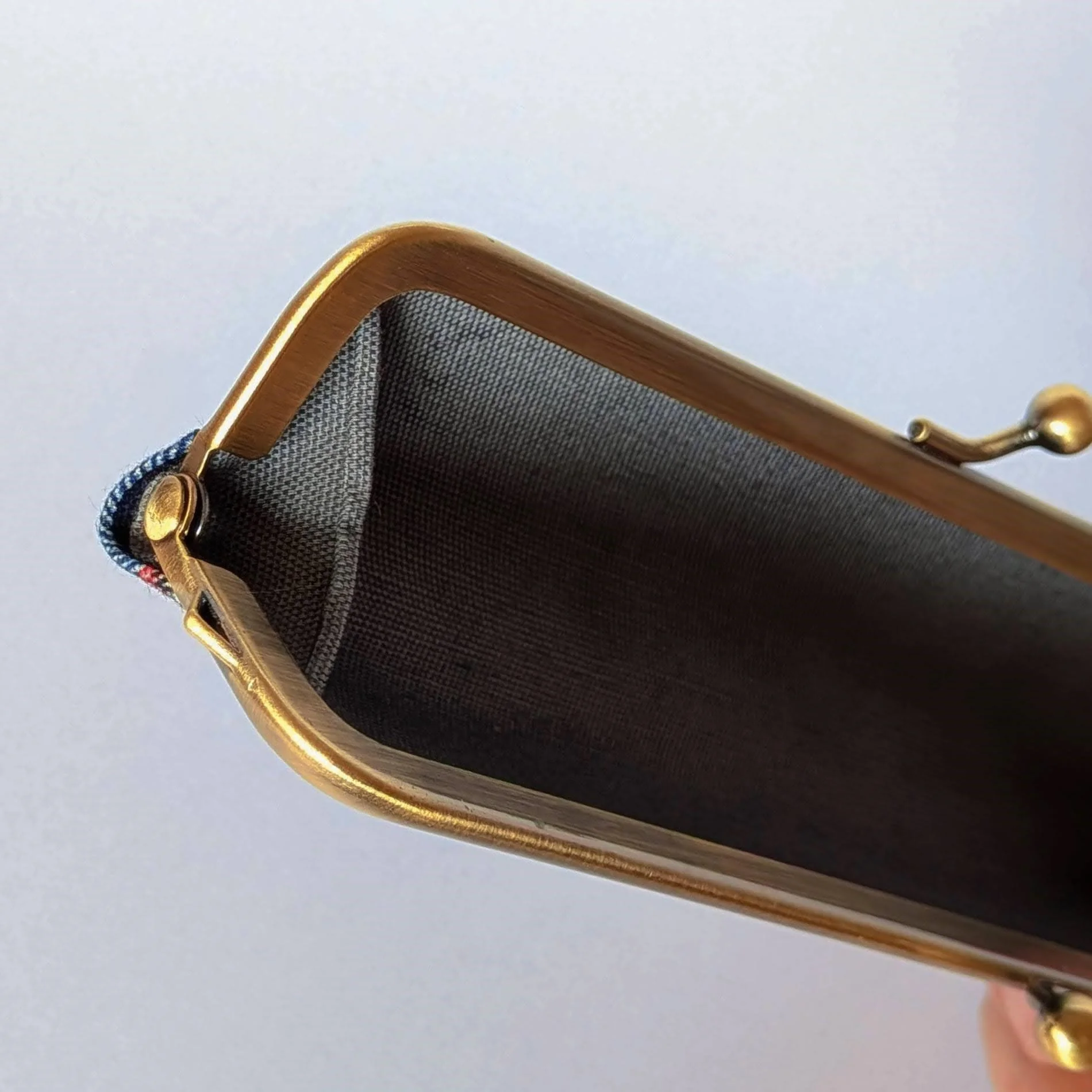 The gusset inside the open pen case